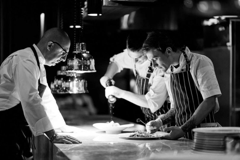 chef working with his team in kitchen
